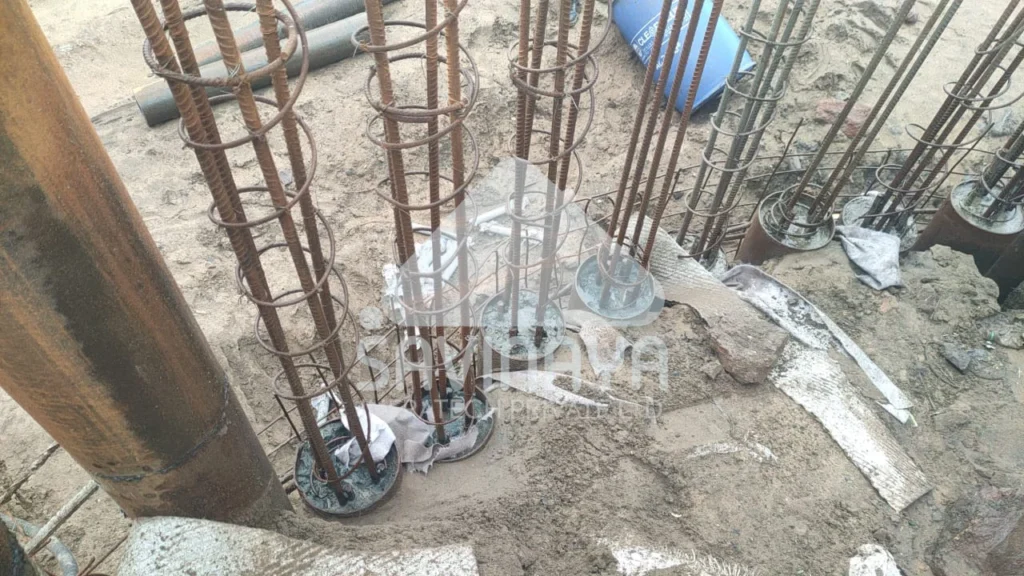 Micropile reinforcement installation process at a construction site